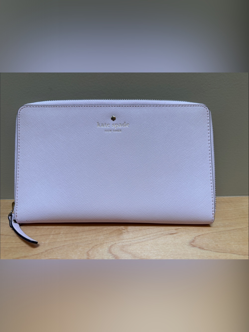 kate spade pale pink zip-around wallet with gold logo
